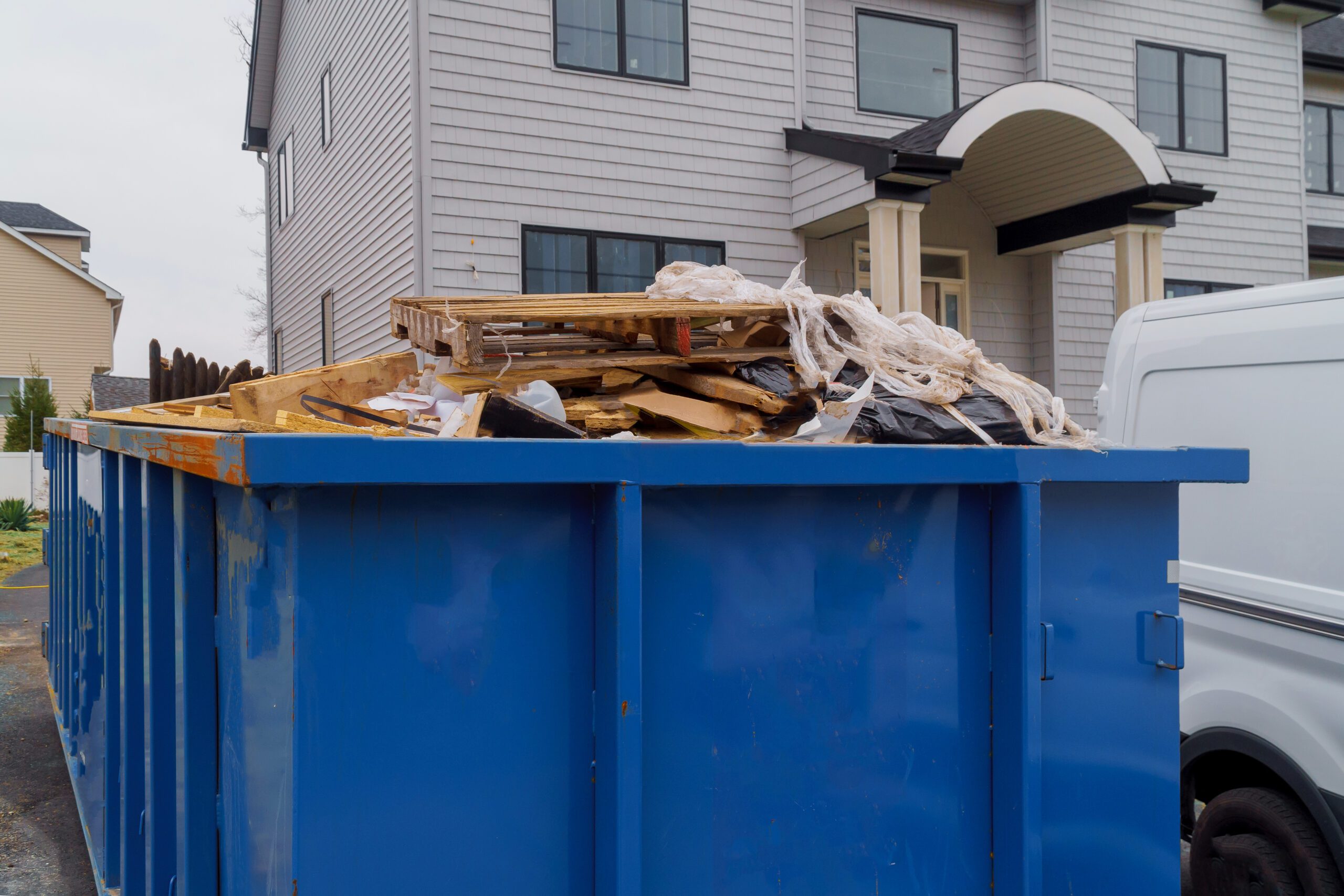 Roll off dumpster removal for residential clean up and debris projects at Hutchinson Dumpster Rental