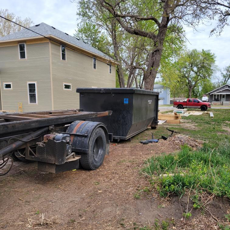 Roll of dumpster rental during spring cleaning at Hutchinson, KS resident Hutchinson Dumpster Rental